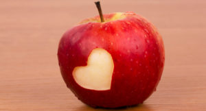 Heart on the fresh apple, a Valentine theme